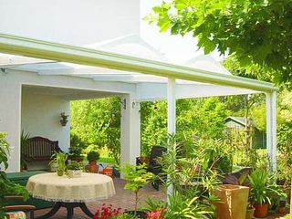 Terrassenüberdachung CASADINO Textile Architektur Balcony Shade, Flowerpot, Awning, Garden, Porch, Houseplant, Outdoor Structure, Patio, Outdoor furniture, Chair