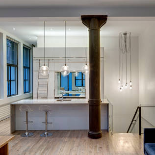 Pendant lights over island installations: a new trend