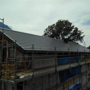 An Elegant, Economical And Eco-friendly Solar Roof Installation In A Home